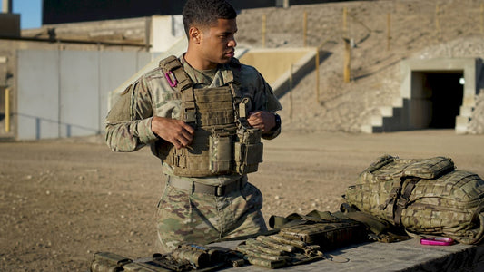 Service member wearing tactical vest outdoors