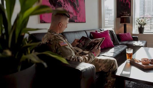 Military member reviewing veteran brands catalog