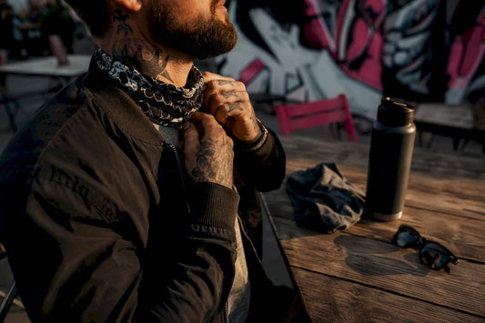 Veteran adjusting patriotic bandana outdoors